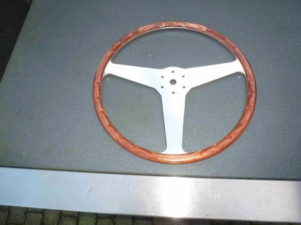 Handcrafted wooden steering wheel for classic car
